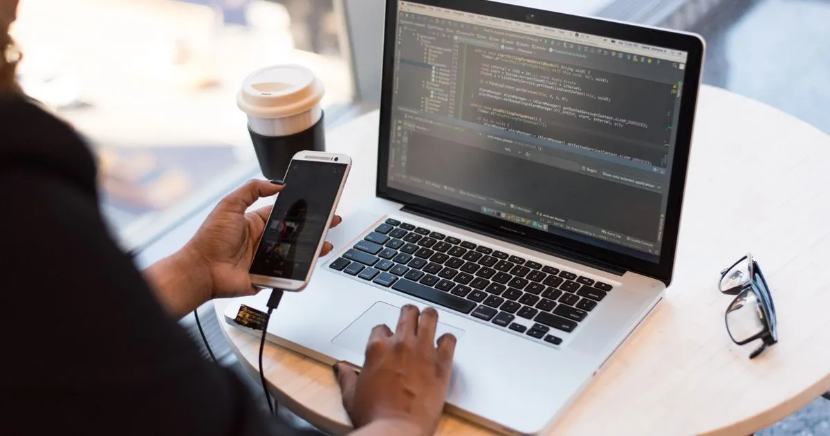 Backend developer reviewing distributed system architecture on a screen