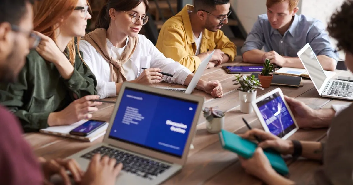 Marketing agency team coordinating with global contractors