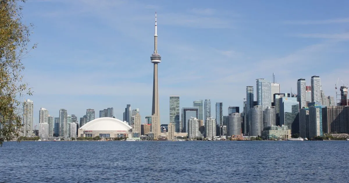 Toronto skyline with the CN Tower — Canadian companies hiring engineering teams in India