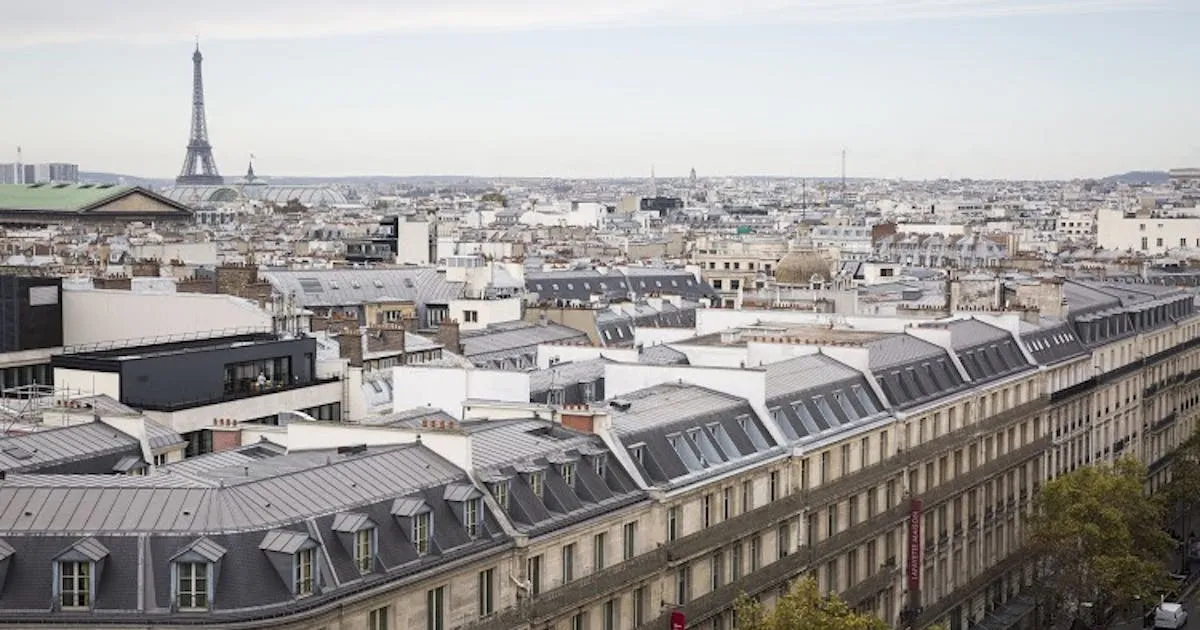 Aerial view of Paris with the Eiffel Tower at the centre, symbol of French enterprise expanding into India