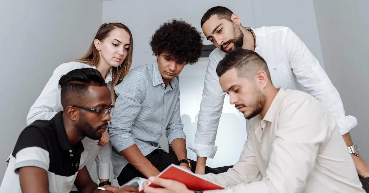 Multicultural team evaluating Omnivoo vs Wisemonk for India hiring