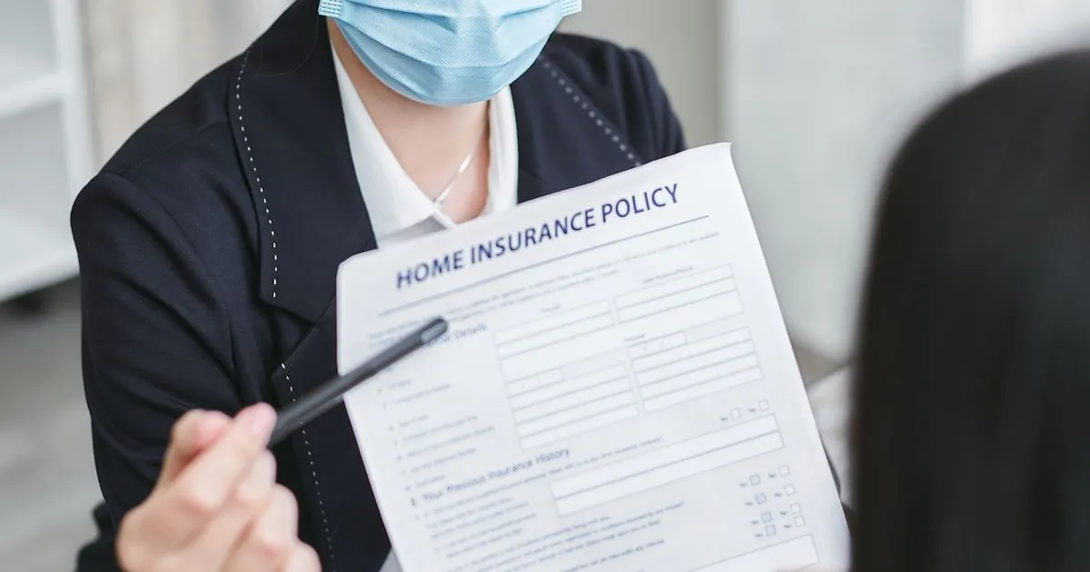 Advisor reviewing insurance policy, Employees' State Insurance coverage