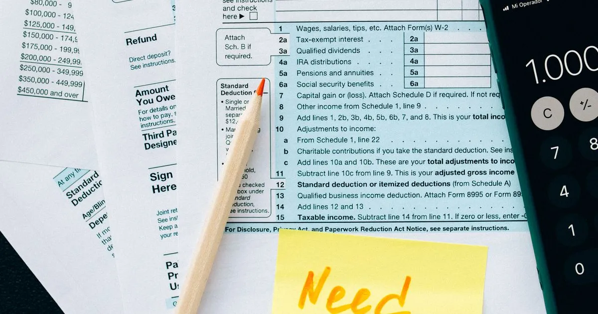 Quarterly tax filing documents on a desk, Form 26Q non-salary TDS return
