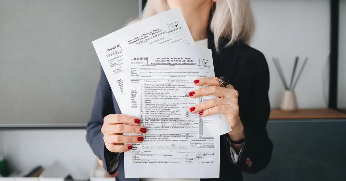 Professional holding tax documents, state professional tax